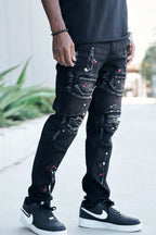 Stacked Paint Splatter Biker Jeans